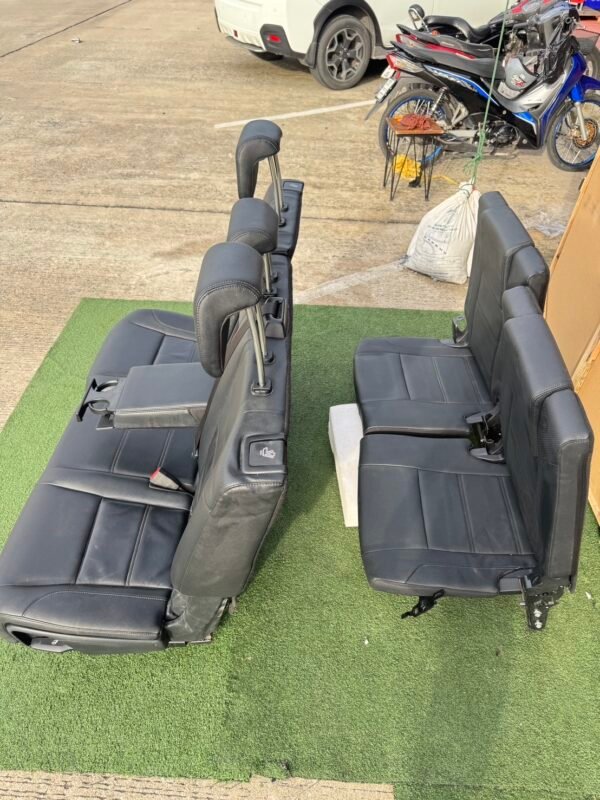 Genuine leather car seat set removed from Ford Everest 2020 (take-off condition). This complete second and third-row seat assembly includes integrated headrests, seat belts, center armrest with cup holders, and original rails for direct fitting - Image 5